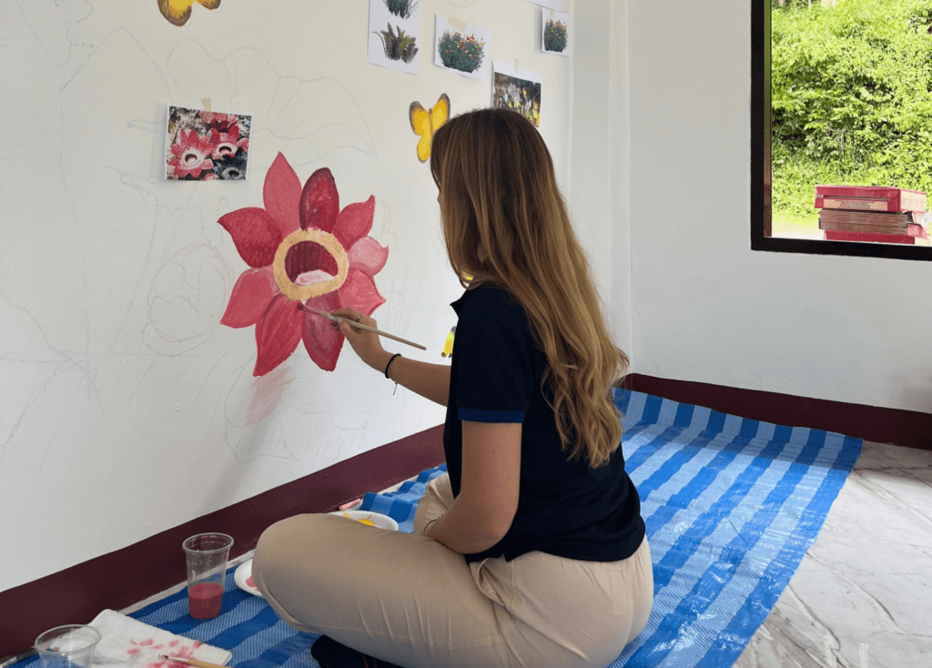 BFITS Thailand Teacher Millie Hogan painting flowers