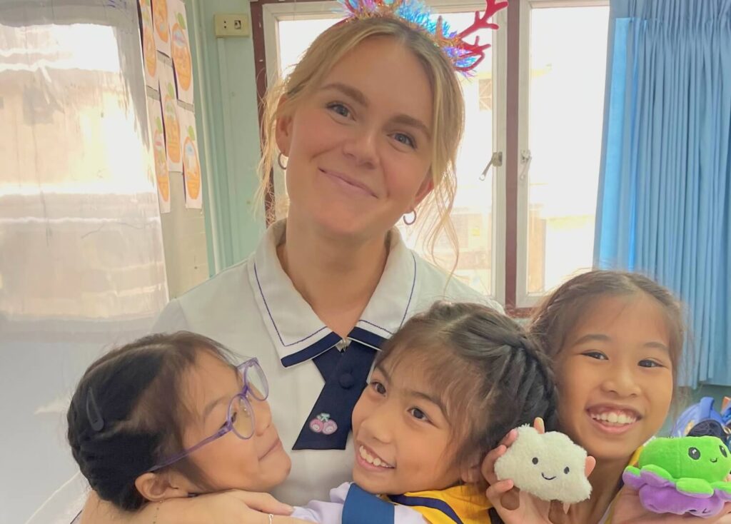 BFITS Thailad Teacher Heather Roy spreading joy with her adorable students and their plushy friends