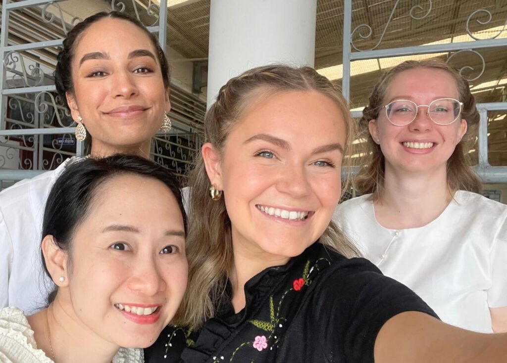 BFITS Thailand Teacher Heather Roy smiling for a selfie in natural light with her colleague at SJC
