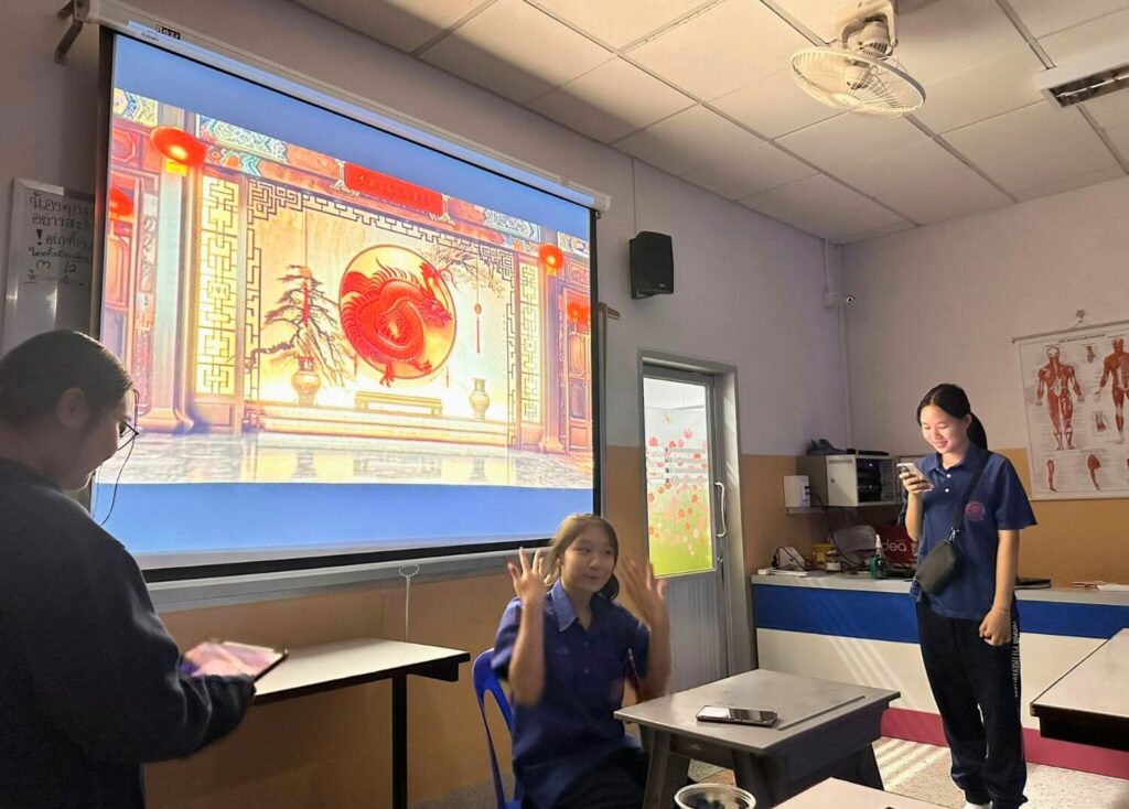 Buriram Pitthayakhom (BP) School M3 students with T. Stewart Brown doing presentations