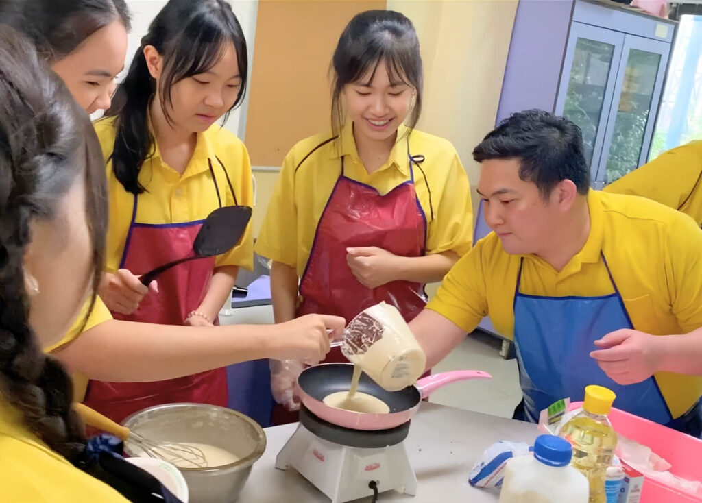 Teacher Anthony Ferrer with Saipanyarangsit (SPR) School BFITS Program Students doing Pancake Chemistry Experiment_Understanding the Maillard Reaction